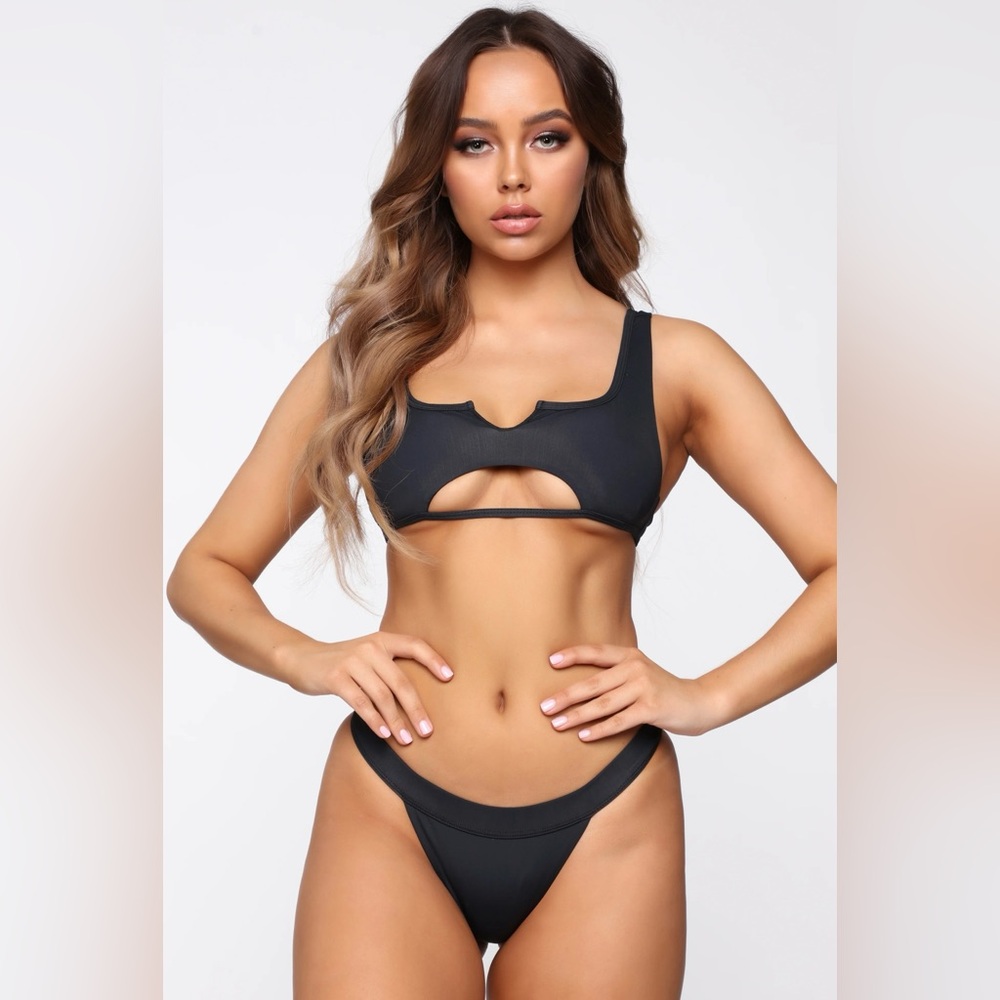 Black two-piece bathing suit, completely new, never been worn before!